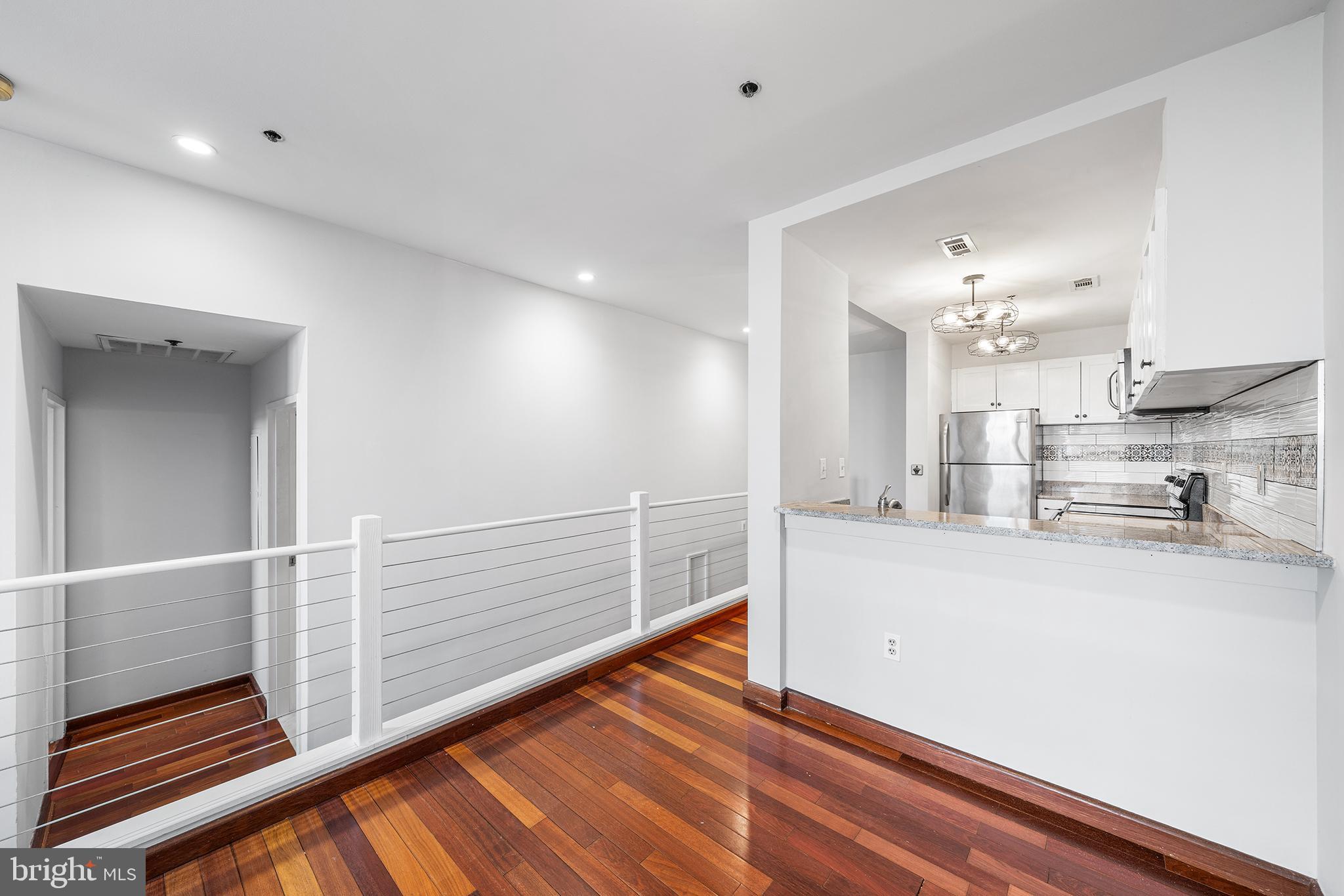 315 New Street, Unit 614 Philadelphia, PA 19106 - Photo 11 of 32 a view of kitchen and kitchen island