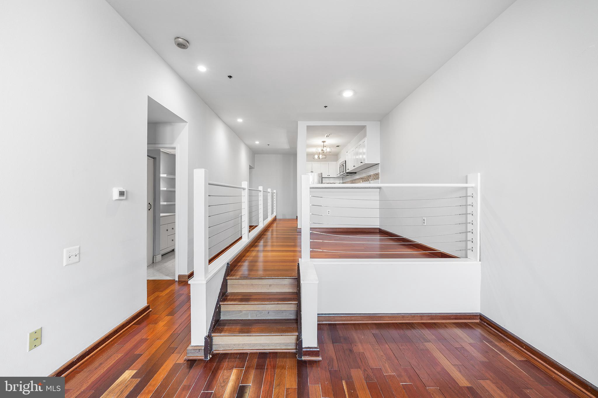 315 New Street, Unit 614 Philadelphia, PA 19106 - Photo 13 of 32 a view of entryway and hall with wooden floor