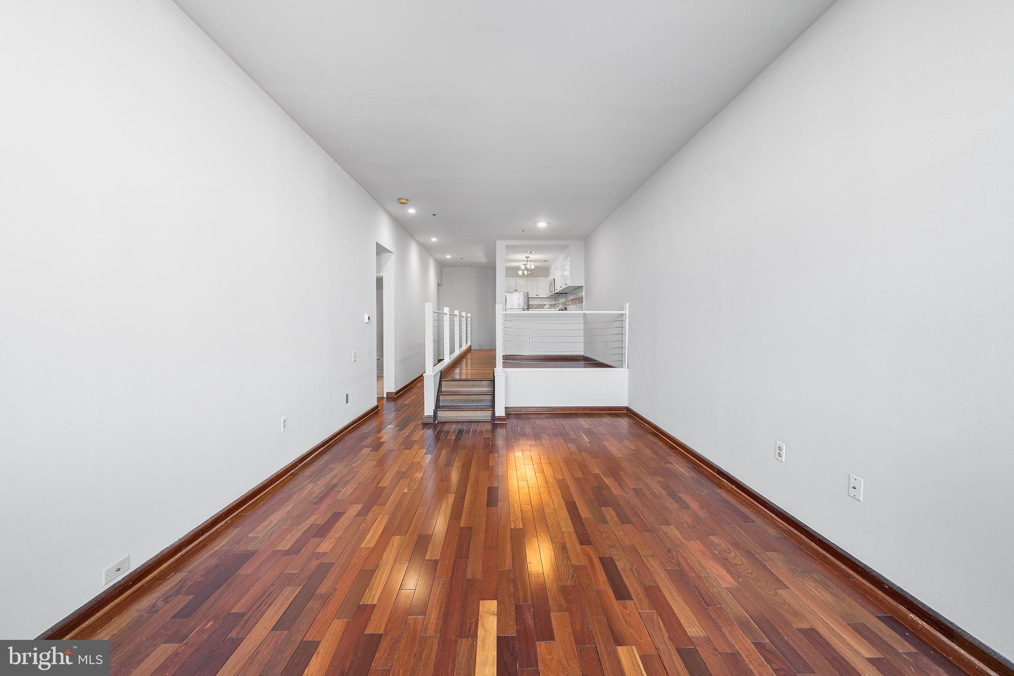315 New Street, Unit 614 Philadelphia, PA 19106 - Photo 14 of 32 a view of empty room with wooden floor