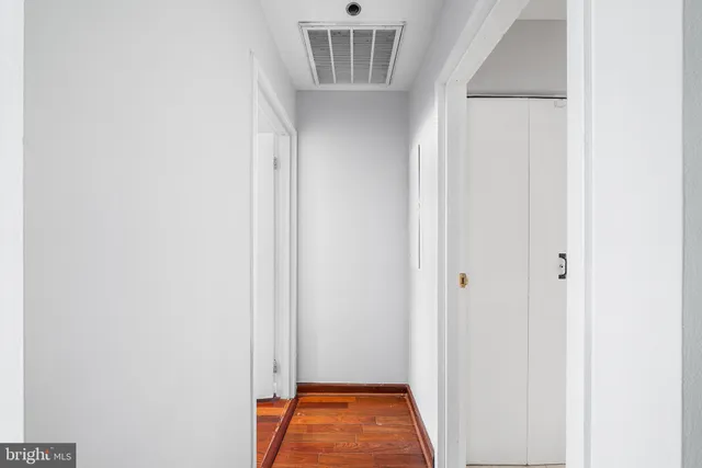 a bathroom with a shower and a toilet