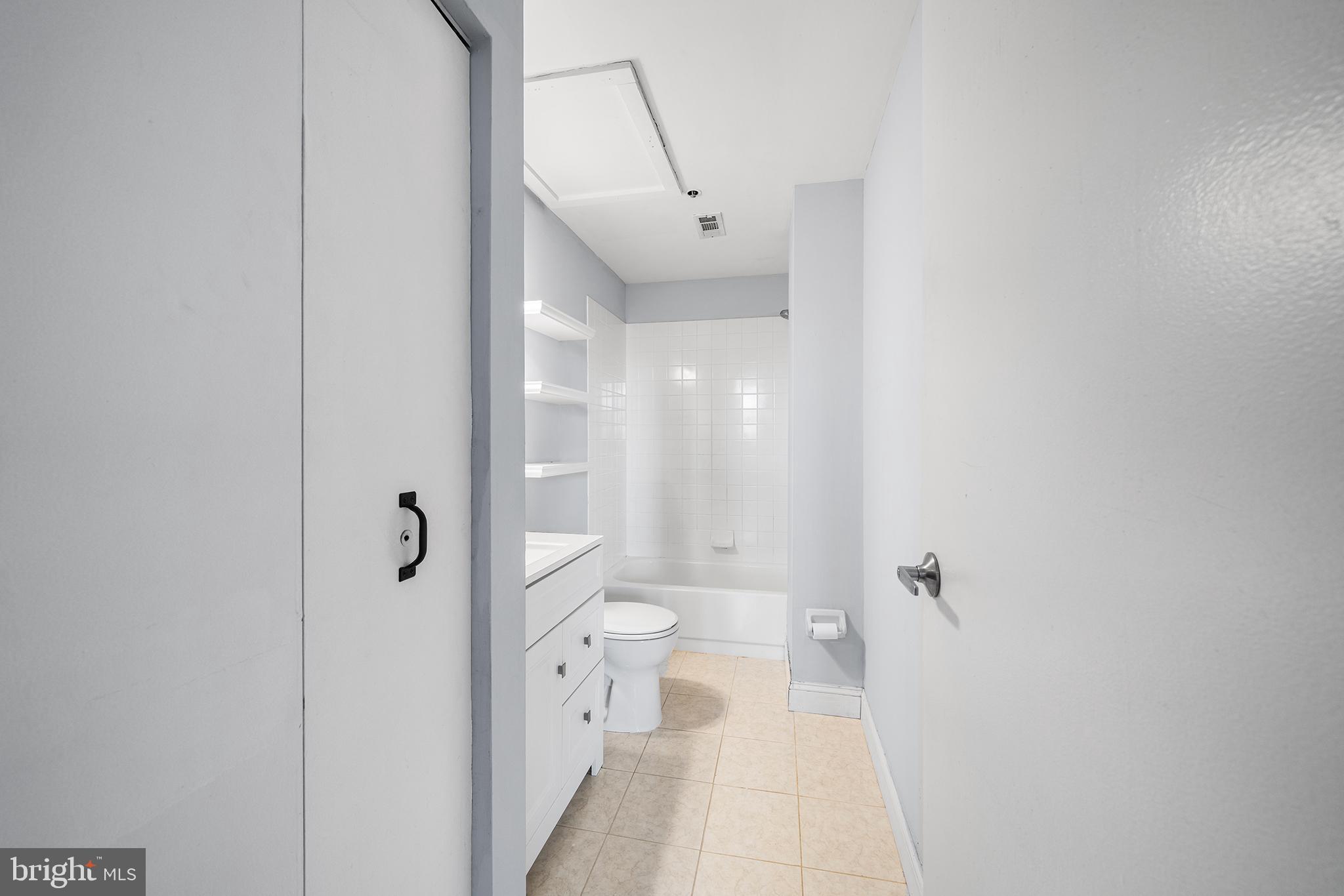 315 New Street, Unit 614 Philadelphia, PA 19106 - Photo 18 of 32 a bathroom with a shower and a toilet