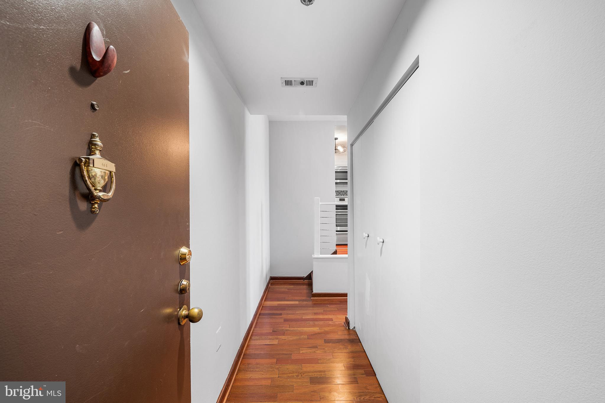 315 New Street, Unit 614 Philadelphia, PA 19106 - Photo 2 of 32 a view of a hallway with wooden floor