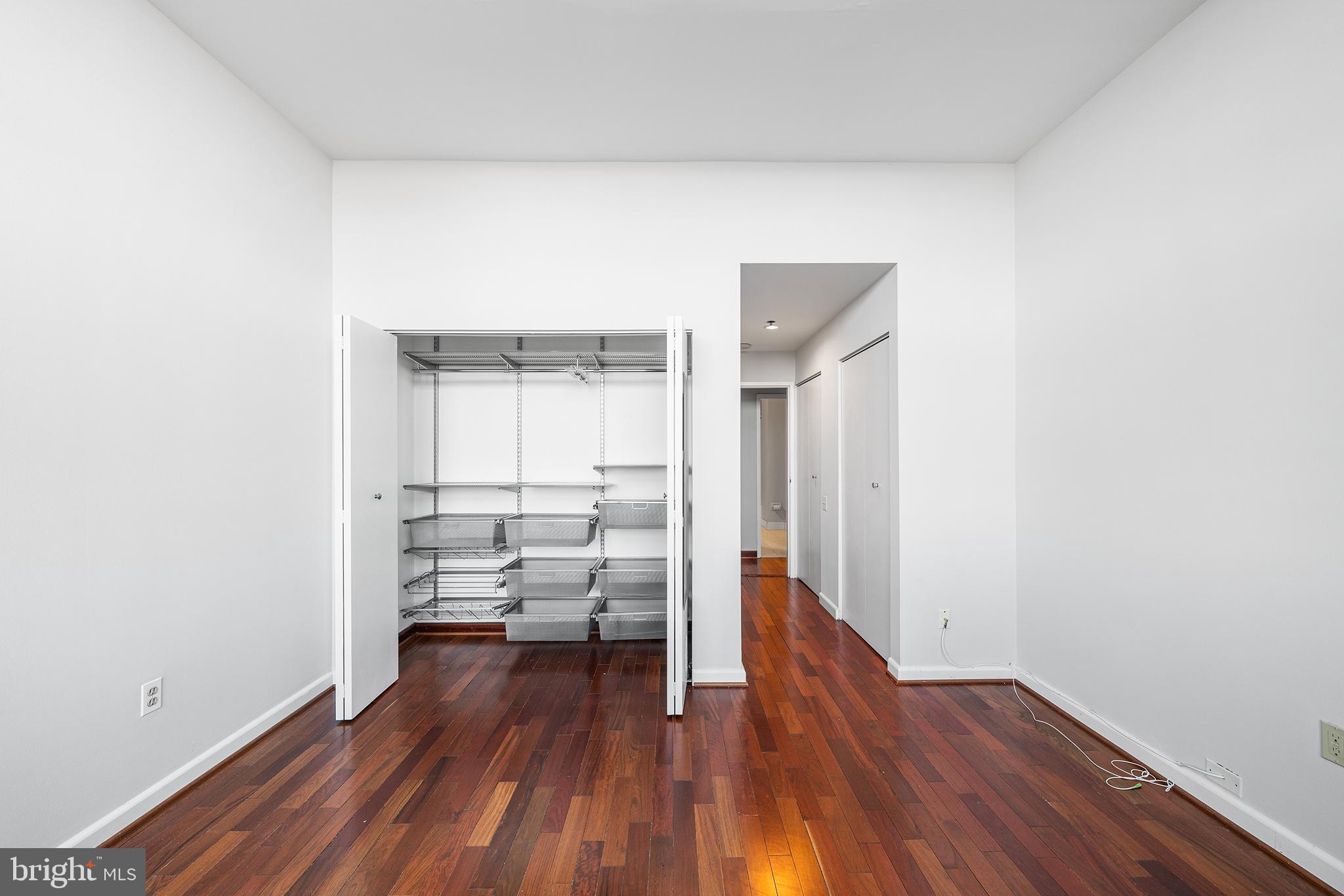 315 New Street, Unit 614 Philadelphia, PA 19106 - Photo 24 of 32 a view of empty room with wooden floor