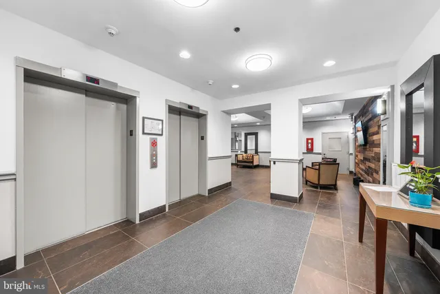 a view of a terrace with furniture and sitting area