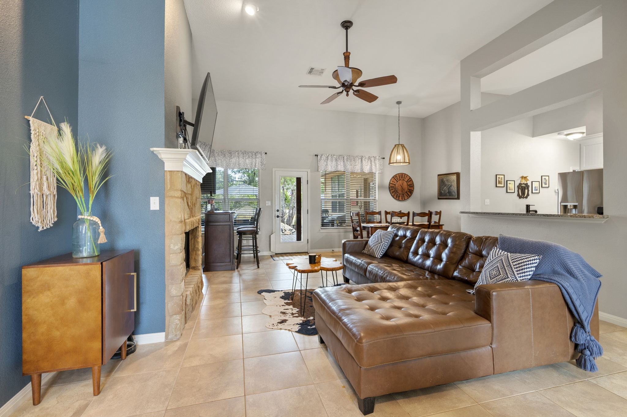11 Rhapsody Lane Wimberley, TX 78676 - Photo 1 of 1 a living room with furniture and a flat screen tv