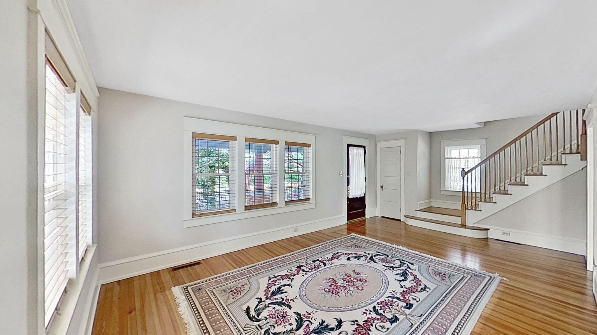 405 Union Street Milton, DE 19968 - Photo 13 of 83 Bright living room with warm hardwood floors.