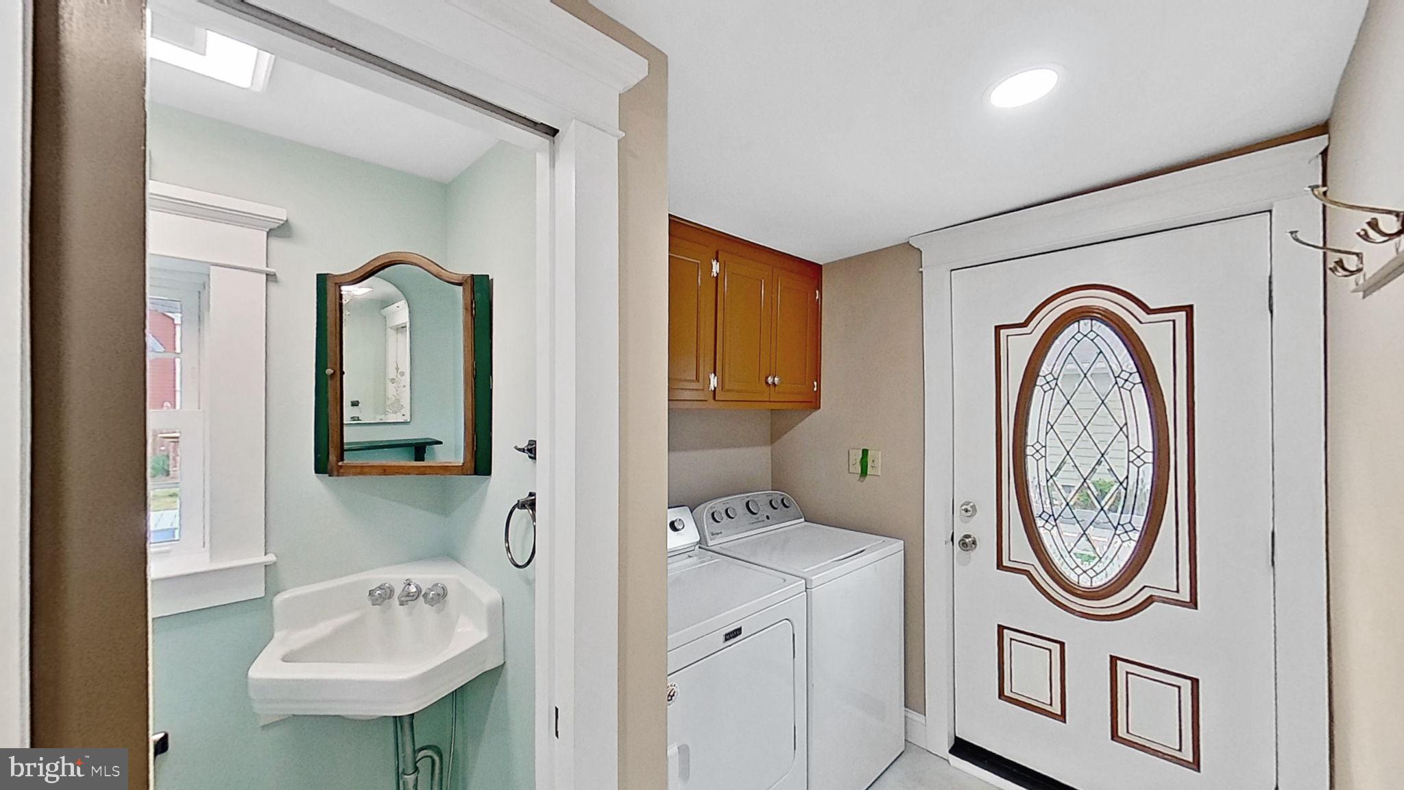 405 Union Street Milton, DE 19968 - Photo 38 of 83 a bathroom with a sink a mirror a toilet and a mirror