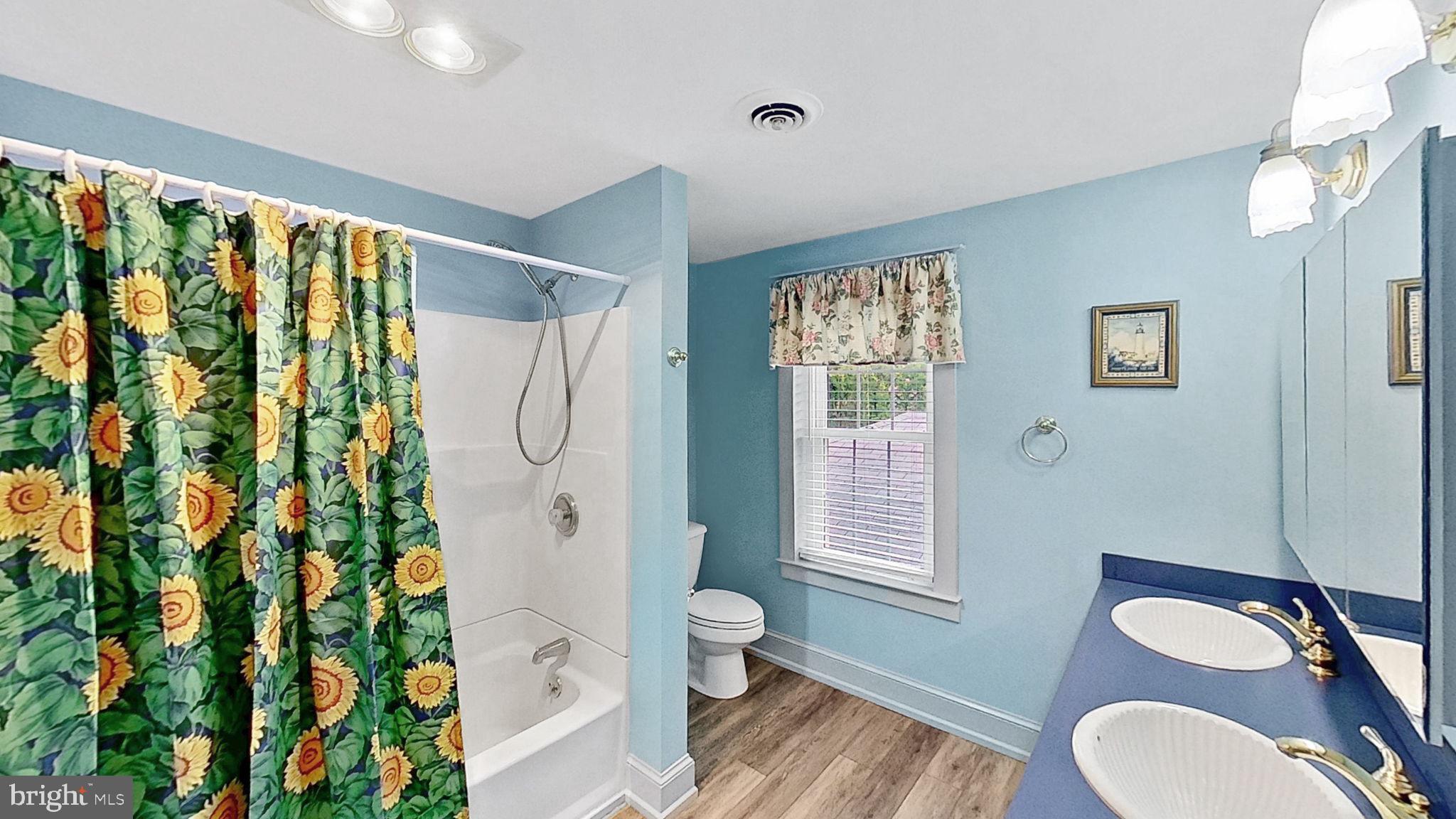 405 Union Street Milton, DE 19968 - Photo 46 of 83 Bright and cheerful bathroom retreat.
