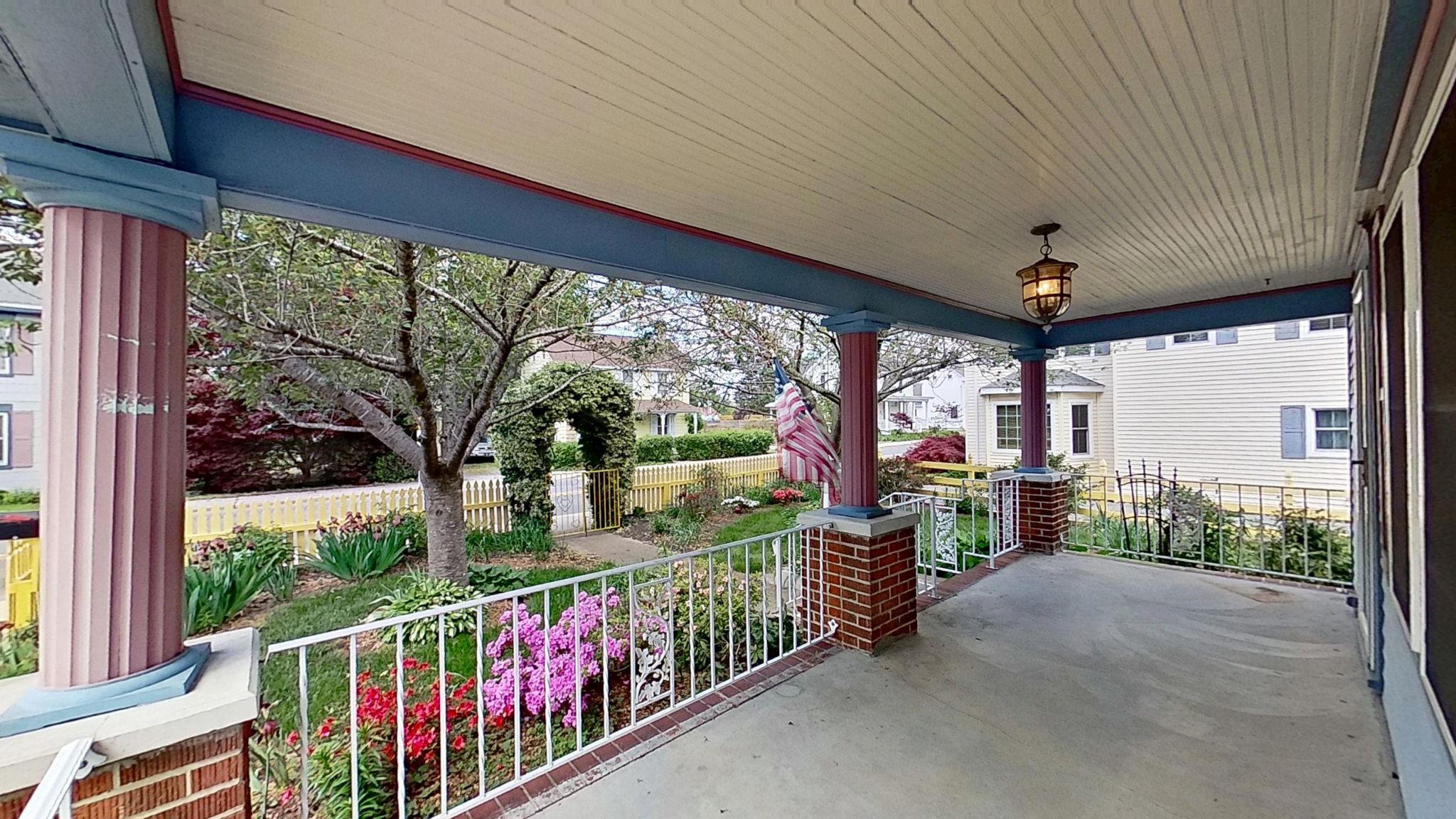 405 Union Street Milton, DE 19968 - Photo 54 of 83 Charming porch with Tranquil garden views.