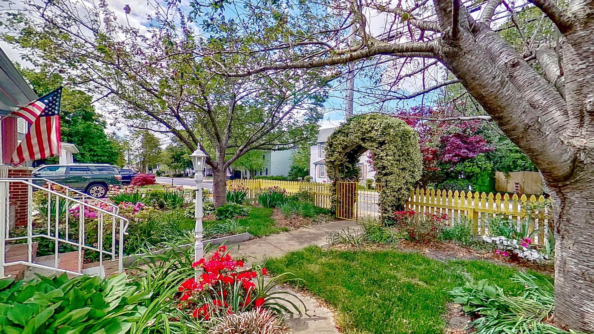 405 Union Street Milton, DE 19968 - Photo 58 of 83 Luscious garden with vibrant blooms.