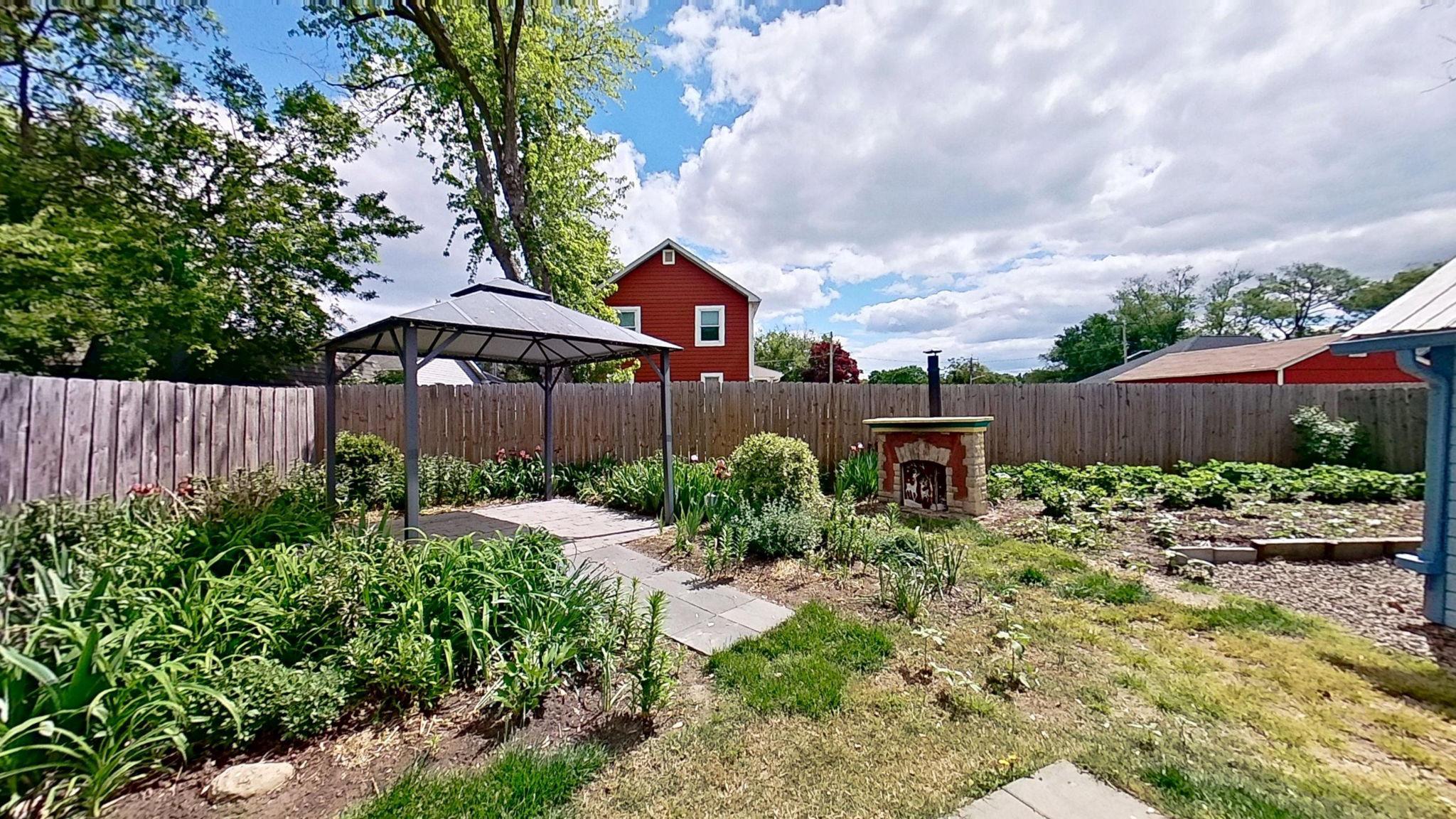 405 Union Street Milton, DE 19968 - Photo 62 of 83 a backyard of a house with lots of green space