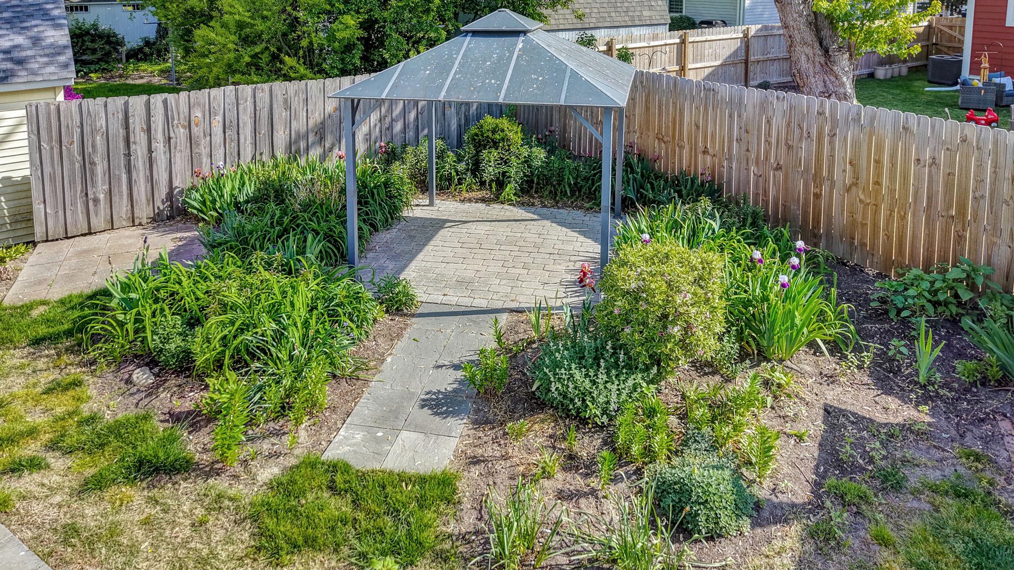 405 Union Street Milton, DE 19968 - Photo 63 of 83 a view of a backyard with a garden