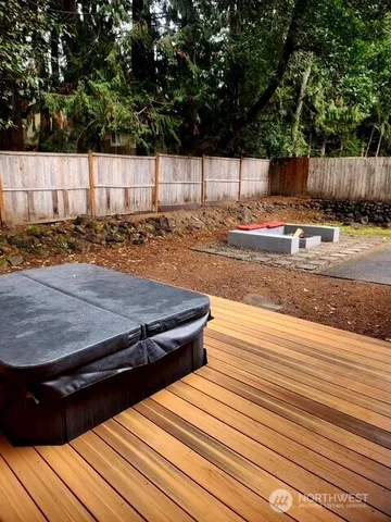 a view of a backyard of the house