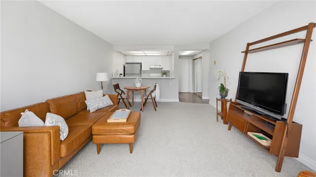 a kitchen that has a sink and a stove
