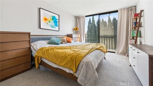 a view of balcony with a potted plant