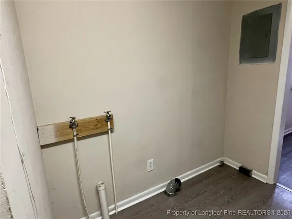 a view of a room with rack on the wall