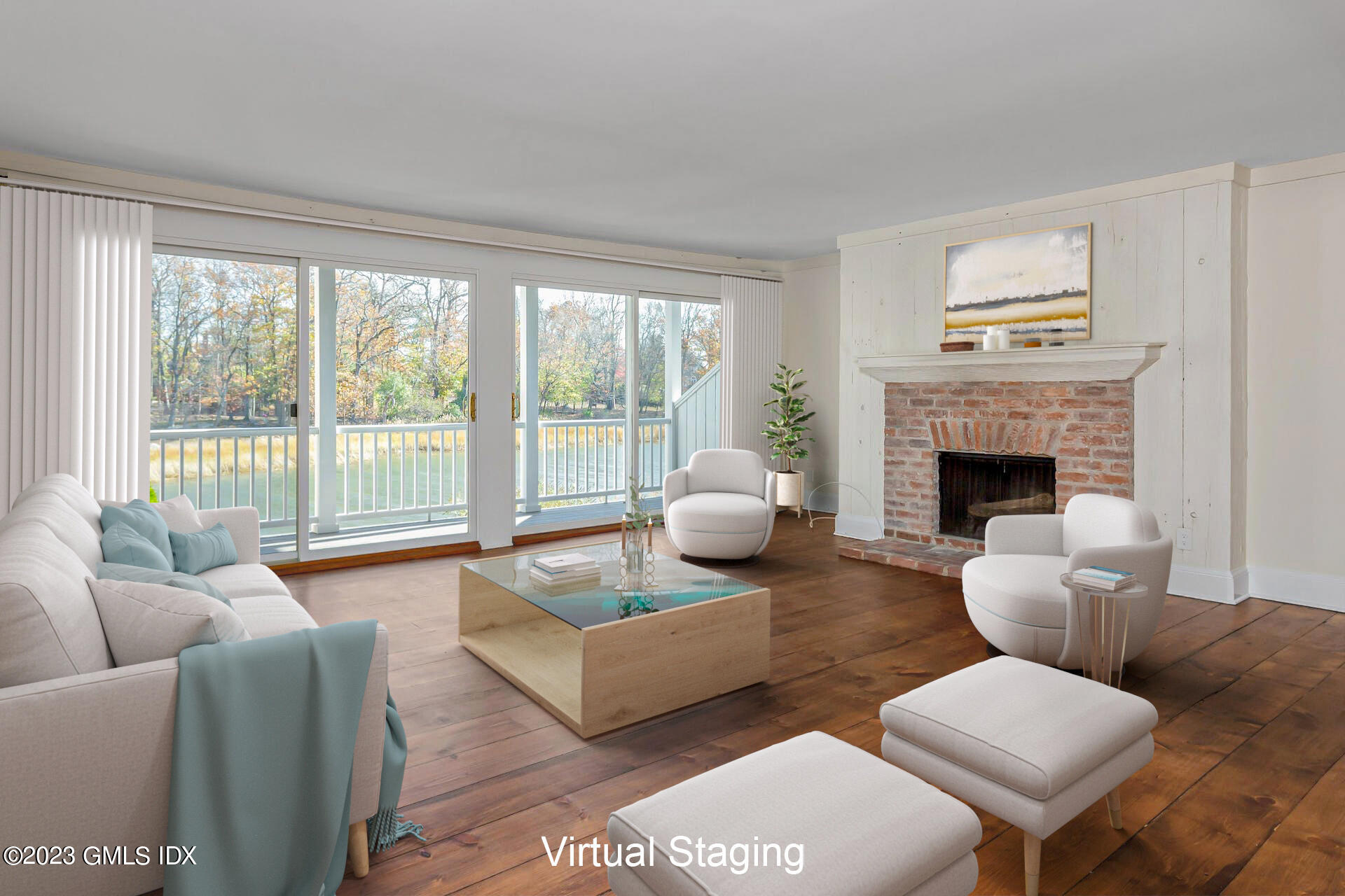 603 Steamboat Road, Unit 6 Greenwich, CT 06830 - Photo 12 of 40 a living room with furniture and a fireplace