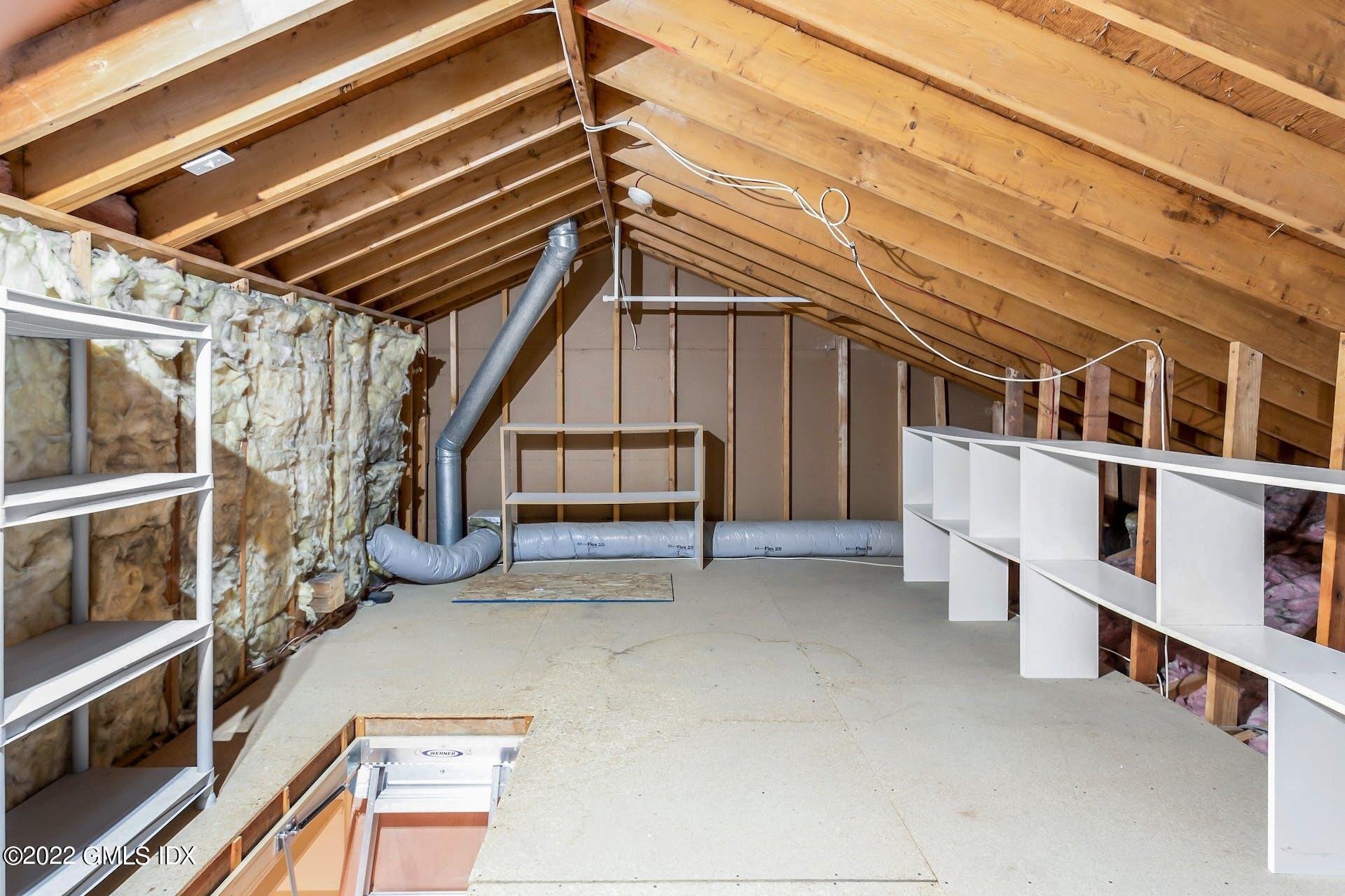 603 Steamboat Road, Unit 6 Greenwich, CT 06830 - Photo 34 of 40 a view of an empty room with stairs