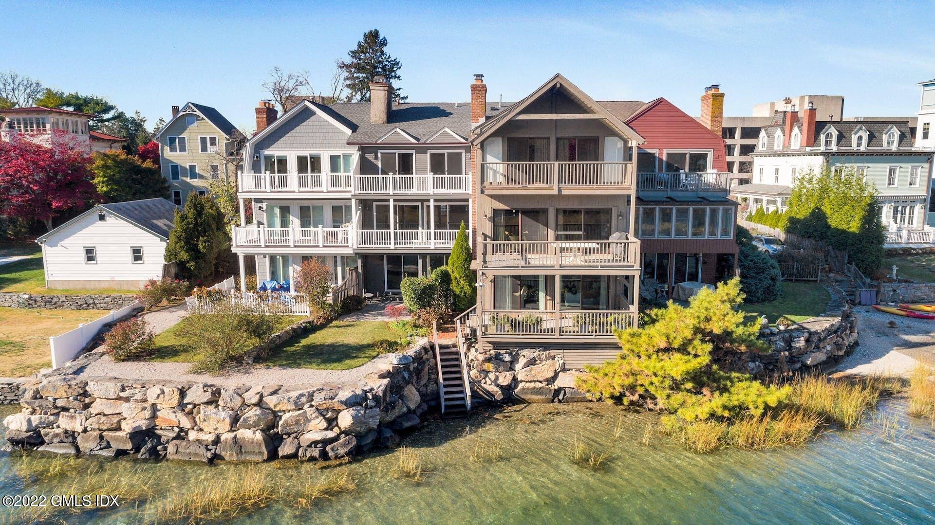 603 Steamboat Road, Unit 6 Greenwich, CT 06830 - Photo 36 of 40 a front view of a house with swimming pool