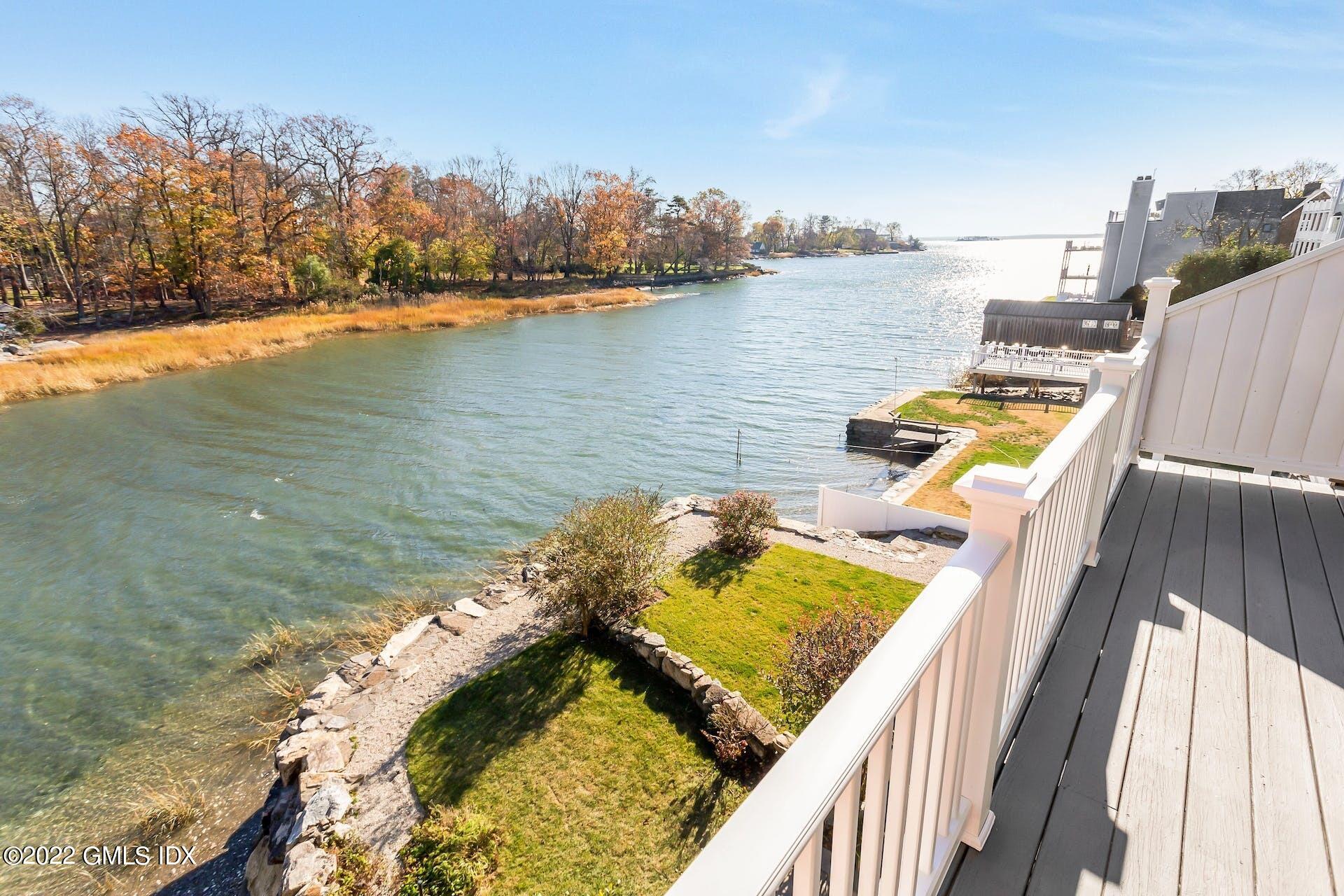 603 Steamboat Road, Unit 6 Greenwich, CT 06830 - Photo 7 of 40 a view of a lake with a ocean view