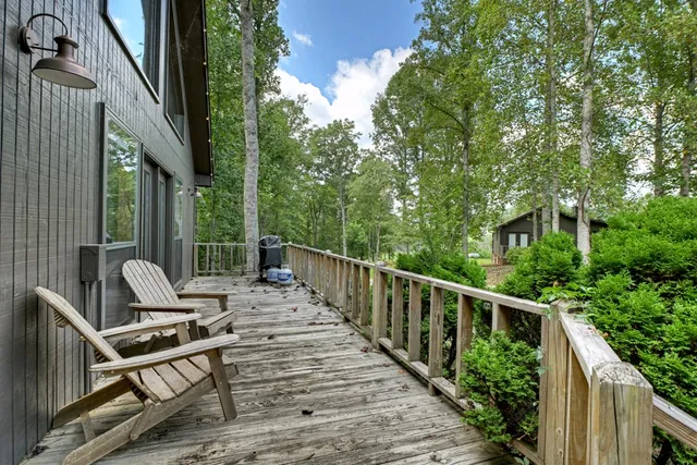 a living room with furniture fireplace and a flat screen tv
