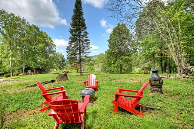 a kitchen with stainless steel appliances granite countertop a stove and a refrigerator
