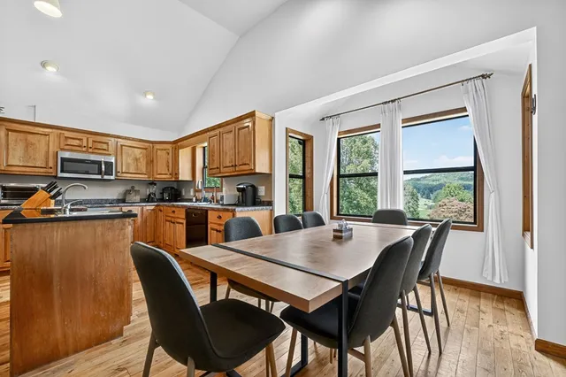 a bathroom with a sink and a large mirror