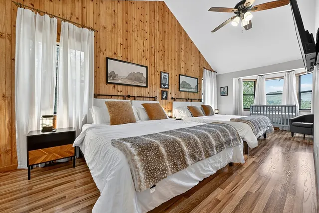 a view of a chair and table in the garden