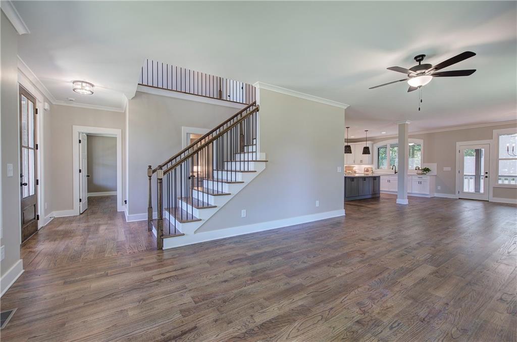 10 Dove Pointe Euharlee, GA 30145 - Photo 14 of 61 a view of an empty room with wooden floor and staircase