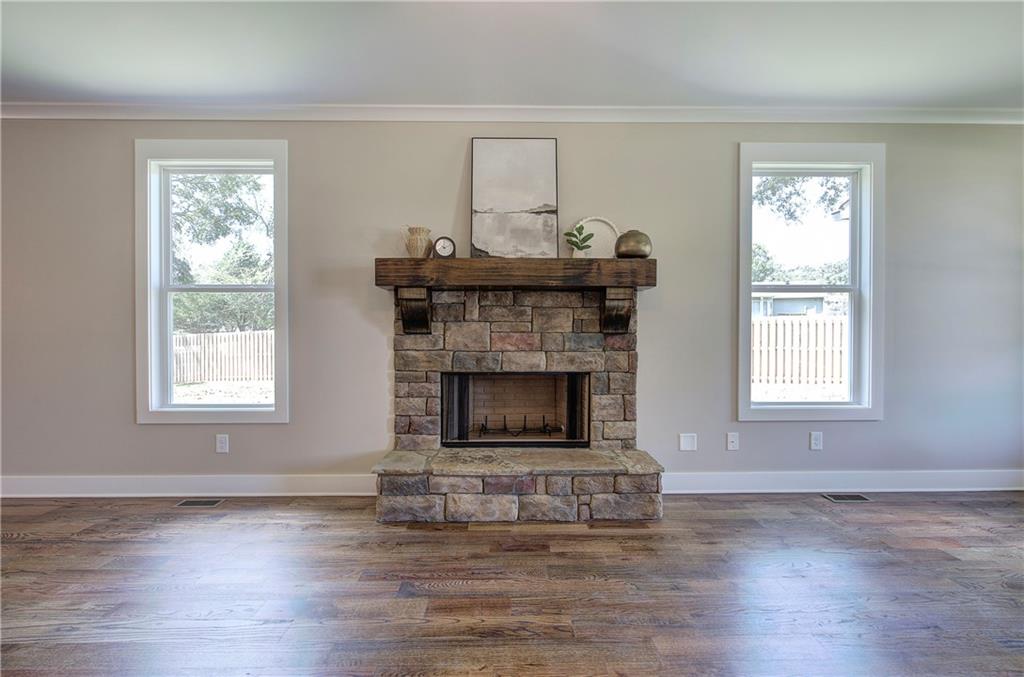 10 Dove Pointe Euharlee, GA 30145 - Photo 15 of 61 a living room with furniture and a fireplace