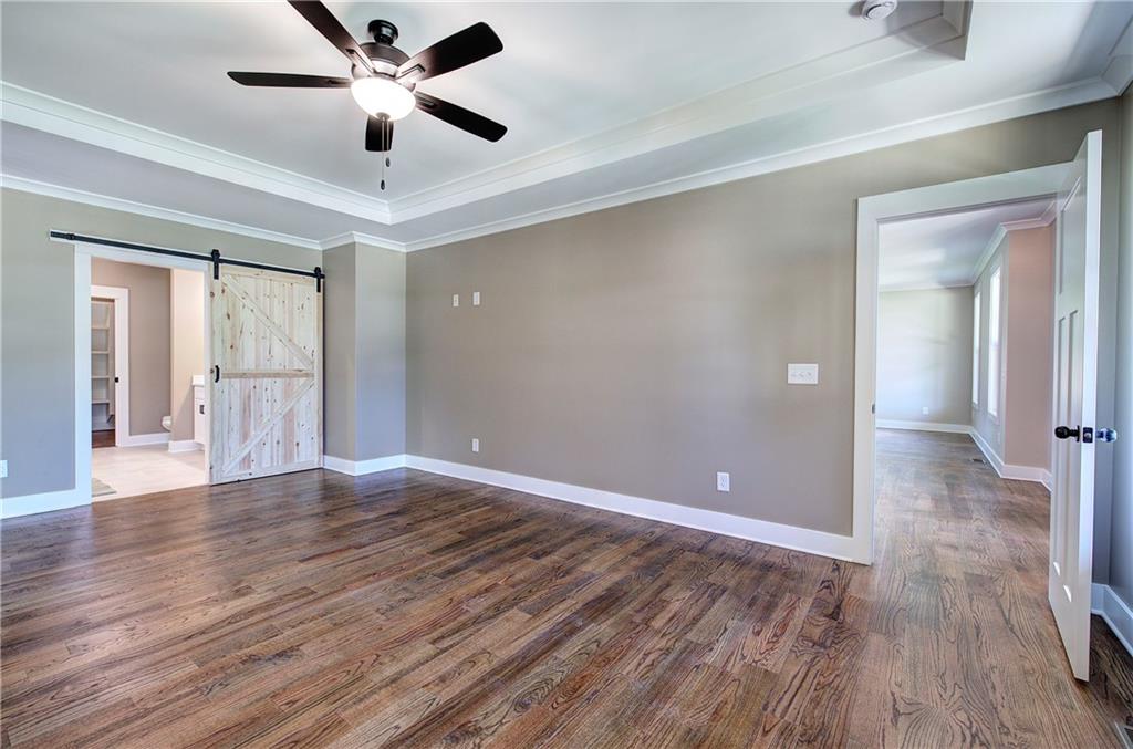 10 Dove Pointe Euharlee, GA 30145 - Photo 25 of 61 wooden floor in an empty room with a window