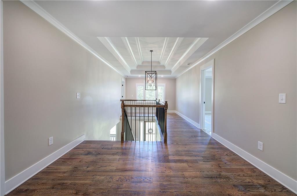 10 Dove Pointe Euharlee, GA 30145 - Photo 32 of 61 a view of a hallway with wooden floor near a window