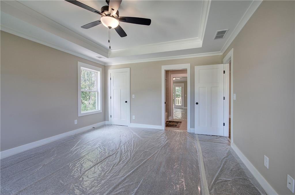 10 Dove Pointe Euharlee, GA 30145 - Photo 38 of 61 a view of empty room with wooden floor and fan