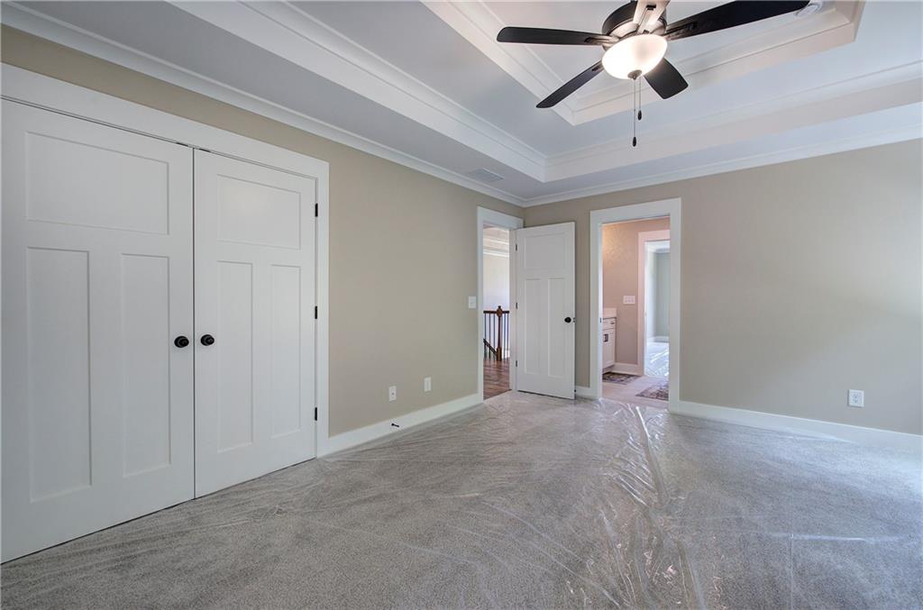 10 Dove Pointe Euharlee, GA 30145 - Photo 41 of 61 a view of an empty room and chandelier fan