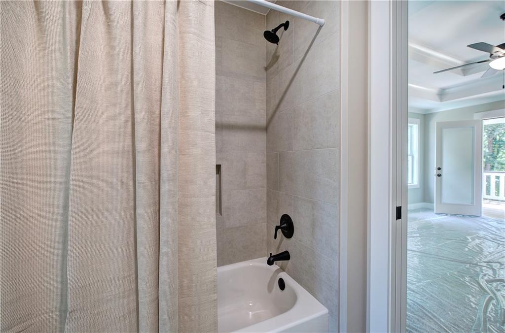 10 Dove Pointe Euharlee, GA 30145 - Photo 49 of 61 a bathroom with a tub and shower
