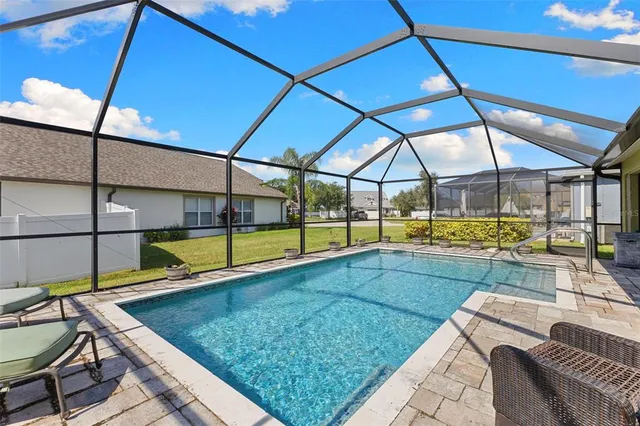a view of a backyard of a house