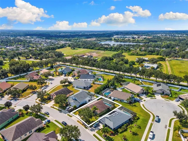 an aerial view of residential building with outdoor space