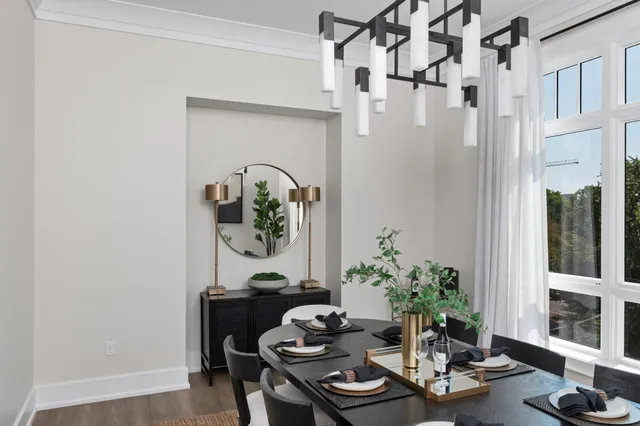 a spacious bathroom with a double vanity sink a large mirror and a glass door shower