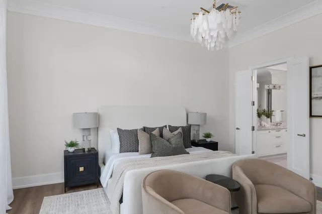 a bedroom with bed and a window