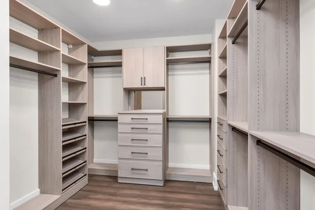 a bathroom with a toilet a sink and bathtub