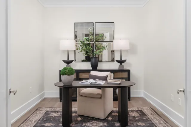 a living room with furniture and a window