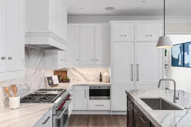 a living room with furniture and flowers