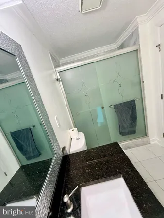 a bathroom with a bathtub and shower