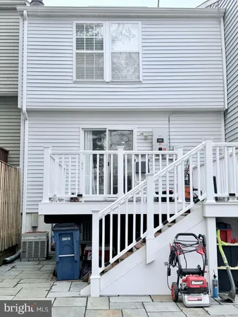 a view of a backyard and sitting area