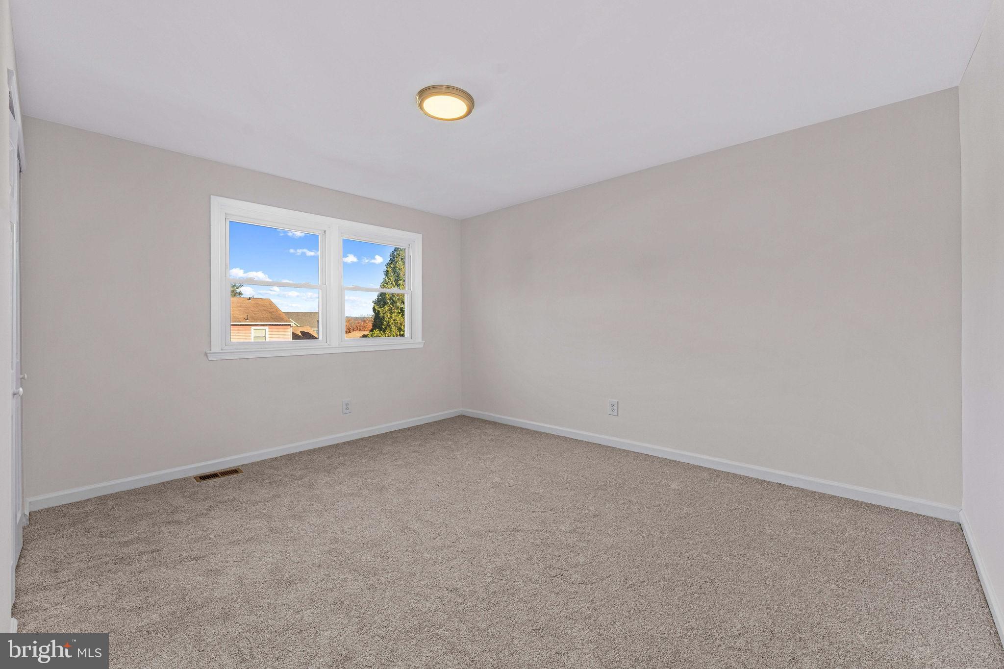 217 Pebble Court Chalfont, PA 18914 - Photo 22 of 34 an empty room with windows