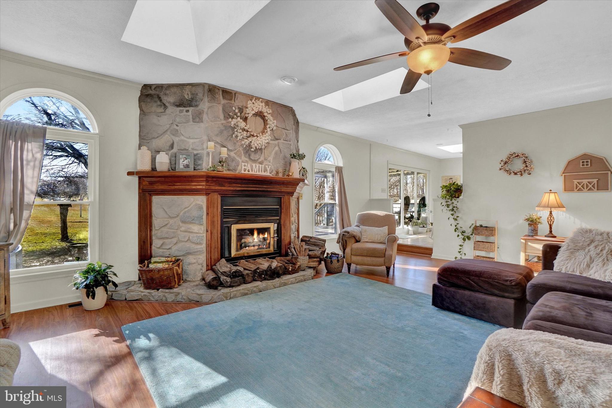 250 Hunt Club Road Fawn Grove, PA 17321 - Photo 13 of 46 Family room with wood burning fireplace