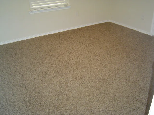a view of a room with an empty space