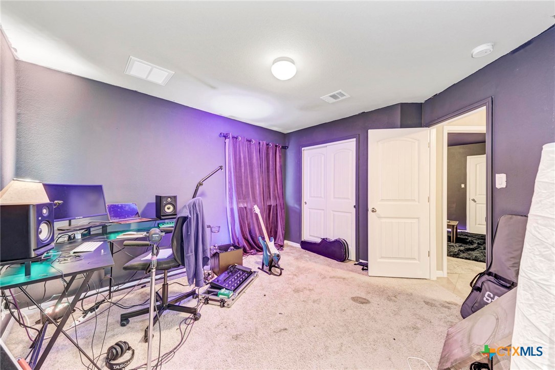 700 Cortona Cove Georgetown, TX 78628 - Photo 25 of 46 Bedroom 3