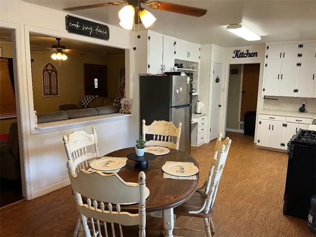 a view of a dining room with furniture