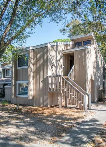 a view of a house with a street